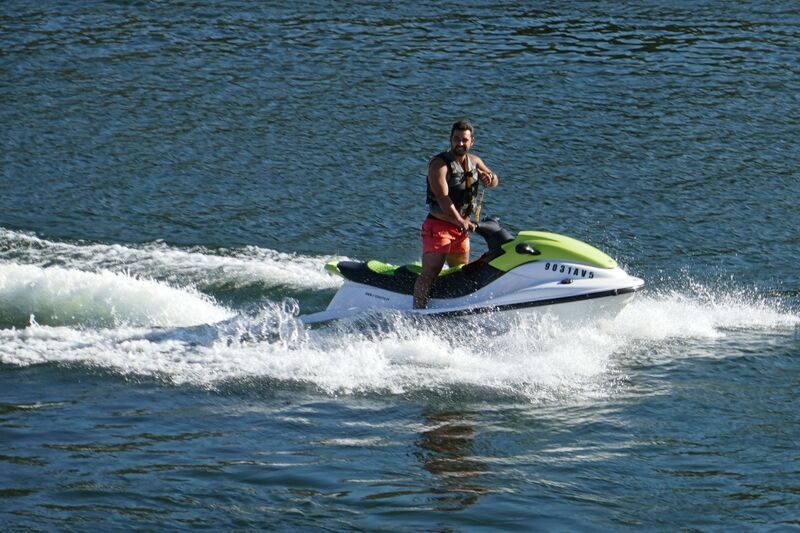 DC 22-0789-004.jpg :: Saga Douro River Cruise, Regua Lamego to Pinhao, River Douro: Jet skier on the River Douro at Peso da Regua. Photo taken 30/08/2022.