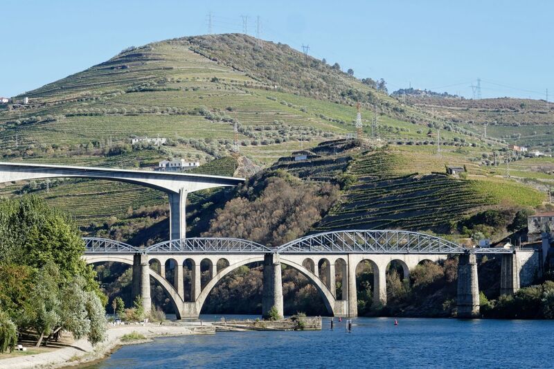 DC 22-0789-012.jpg :: Saga Douro River Cruise, Regua Lamego to Pinhao, River Douro: The Régua Railway Bridge at Peso da Régua, also known as the Régua Road Bridge and Ponte Miguel Torga at Peso da Régua. Photo taken 30/08/2022.