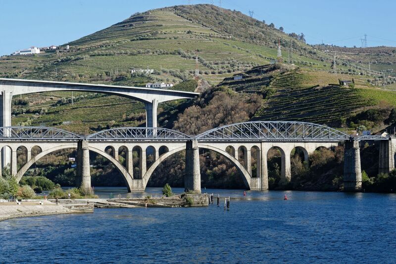 DC 22-0789-013.jpg :: Saga Douro River Cruise, Regua Lamego to Pinhao, River Douro: The Régua Railway Bridge at Peso da Régua, also known as the Régua Road Bridge and Ponte Miguel Torga at Peso da Régua. Photo taken 30/08/2022.
