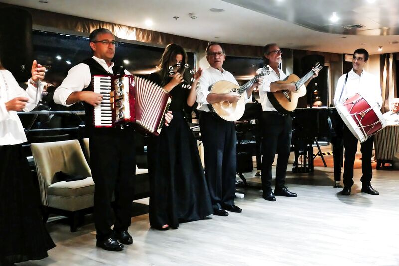 DC 22-0789-033.jpg :: Saga Douro River Cruise, Regua Lamego to Pinhao, River Douro: Fado musicians, known as fadistas, are performers of Fado, a traditional Portuguese music genre characterized by deep emotions and longing, or saudade. Photo taken 30/08/2022.