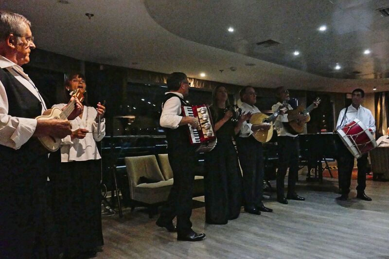 DC 22-0789-038.jpg :: Saga Douro River Cruise, Regua Lamego to Pinhao, River Douro: Fado musicians, known as fadistas, are performers of Fado, a traditional Portuguese music genre characterized by deep emotions and longing, or saudade. Photo taken 30/08/2022.