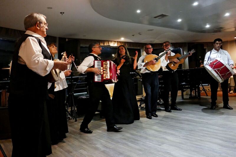 DC 22-0789-051.jpg :: Saga Douro River Cruise, Regua Lamego to Pinhao, River Douro: Fado musicians, known as fadistas, are performers of Fado, a traditional Portuguese music genre characterized by deep emotions and longing, or saudade. Photo taken 30/08/2022.