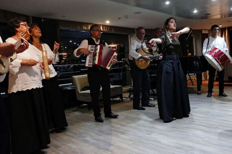 DC 22-0789-052.jpg :: Saga Douro River Cruise, Regua Lamego to Pinhao, River Douro: Fado musicians, known as fadistas, are performers of Fado, a traditional Portuguese music genre characterized by deep emotions and longing, or saudade. Photo taken 30/08/2022.