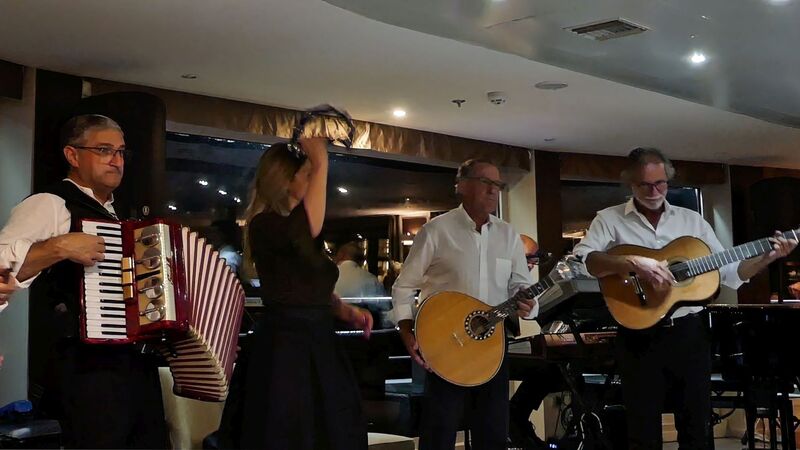 DC 22-0789-053.jpg :: Saga Douro River Cruise, Regua Lamego to Pinhao, River Douro: Fado musicians, known as fadistas, are performers of Fado, a traditional Portuguese music genre characterized by deep emotions and longing, or saudade. Photo taken 30/08/2022.