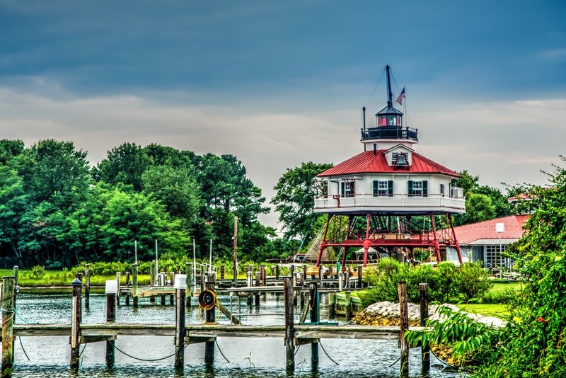 Tending the Chesapeake (DLM_20140817_039_0022_tonemapped_web).jpg :: Drum Point Lighthouse in Solomons Island. Standing watch at Calvert Marine Museum. It is 1 of the 3 remaining screw pile, cottage-type lighthouses out of the original 45 that used to dot the Chesapeake Bay. 