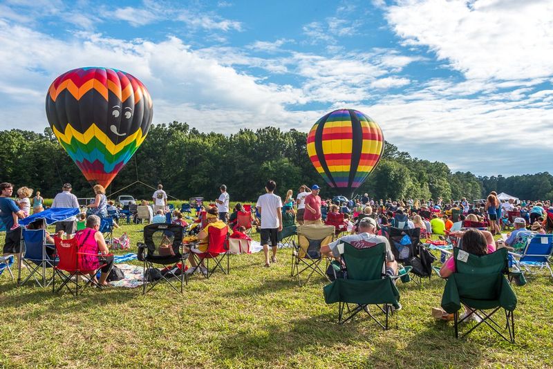 Awaiting the Ascension (DLM_20160805_041_0051_web).jpg :: Spectators await the multiple balloon ascension as they enjoy the rise and descent of tethered balloon riders during the Great Chesapeake Balloon and Wine Festival at Triple Creek Winery in Cordova, MD.  