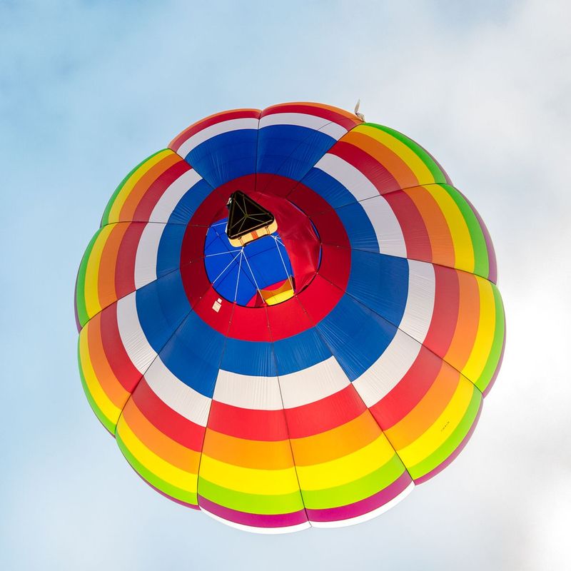 Color me a rainbow (DLM_20160805_041_0172_web).jpg :: Magnificent colors light up the sky and delight spectators over Cordova MD during the balloon ascension during the Great Chesapeake Balloon and Wine Festival at Triple Creek Winery