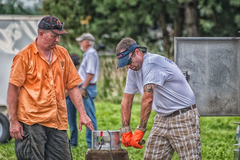 Fuel Prep (DLM_20160805_041_0089_web).jpg :: Sky Candy crew members prepare their tanks for the balloon glow later in the evening during the Great Chesapeake Balloon and Wine Festival at Triple Creek Winery in Cordova, MD