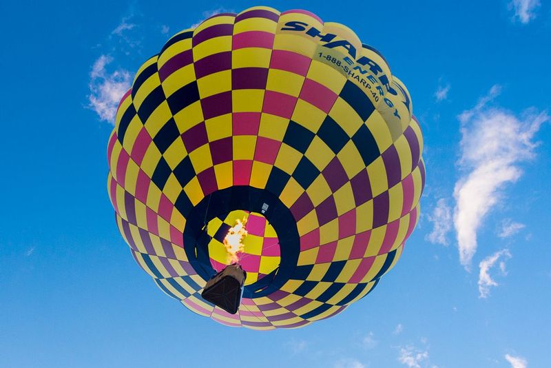 The View from Down Under (DLM_20160805_041_0384_web).jpg :: Flames shoot up to lift this beautiful balloon higher and higher at the Great Chesapeake Balloon and Wine Festival in Cordova MD