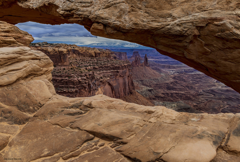 Mesa Arch Window Into Time.jpg :: Mesa Arch
Gazing out into a window into time
The shaping of this world into the future.
The beauty of the sculptures that were left behind.
The layers of the shifting sand carving out the rock
The diversity of the rugged landscape
Sheer cliff walls leading to the valley below
Pinnacle Peaks that reach to the sky
The snowcapped mountains being fed by the winters storm
Creating the next layer of creativity for this expansive window view.