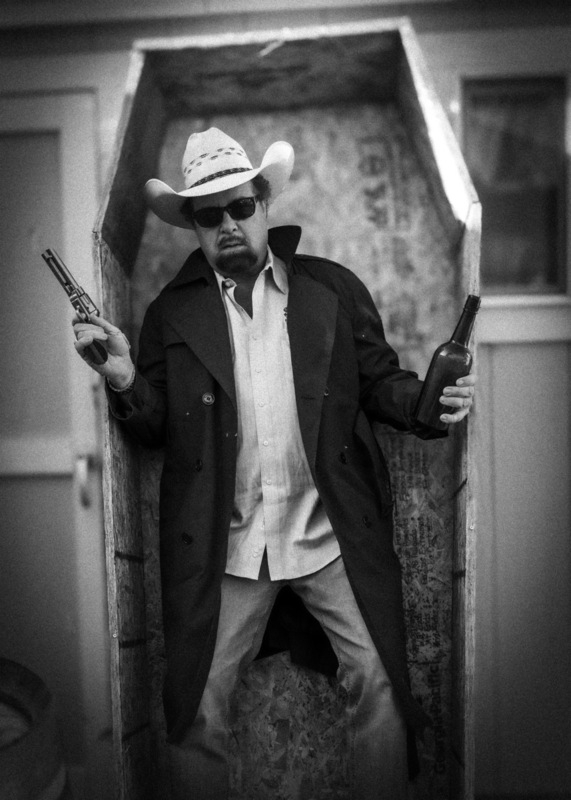 Mike Mulligan Booze Guns Coffin.jpg