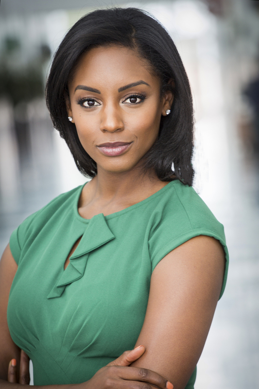 African American woman in green dress in modern corporate building lobby 089A.jpg :: African American woman in green dress in modern corporate building lobby