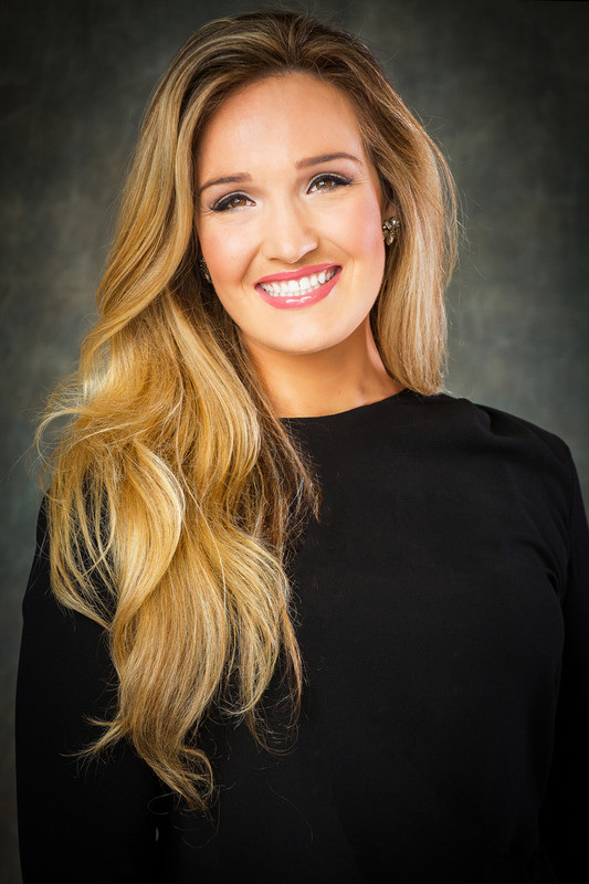 Blonde woman in black 001.jpg