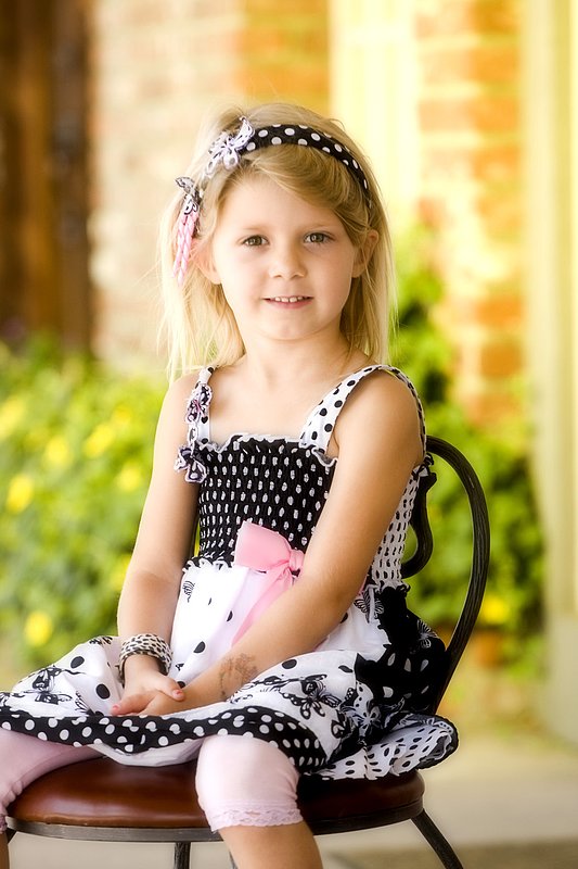 Little Girl on Chair 1.jpg