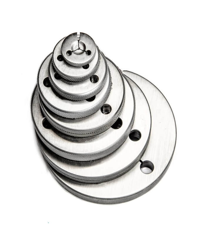 Round Metal Gauges of Different sizes arranged in an artisitc way 001 .jpg :: Round Metal Gauges of Different sizes arranged in an artisitc way on a white background