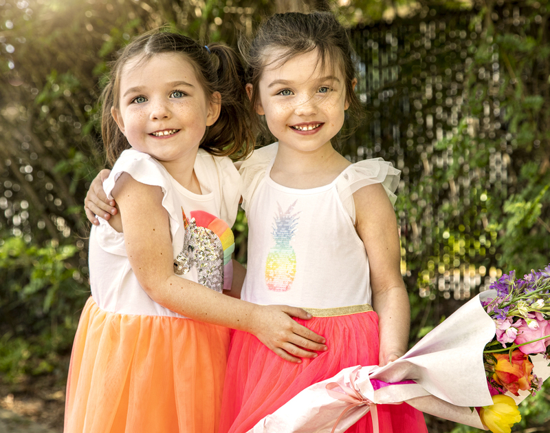 Sisters Holding Flowers 001(1).jpg
