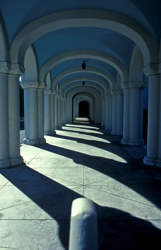 Archway Pattern.jpg :: More shadows, this time mixed with muted colors. What really makes this shot is the repeating patterns formed by the arches and the shadows. If I remember correctly, this is a breezeway on one of the campuses at Brooks Institute of Photography in Santa Barbara, CA.