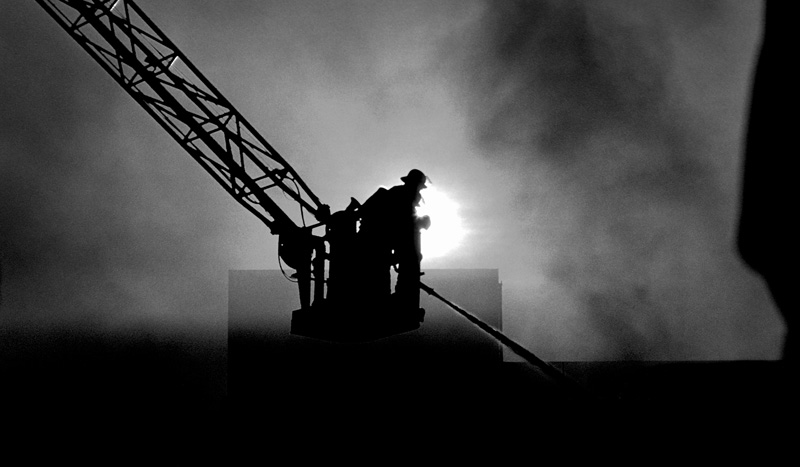 Bear Creek Fire.jpg :: This firefighter was working an apartment fire at Bear Creek Apts in MD, where I live in 1972-ish. Shot with color slide film, scanned and coverted to B&W.
