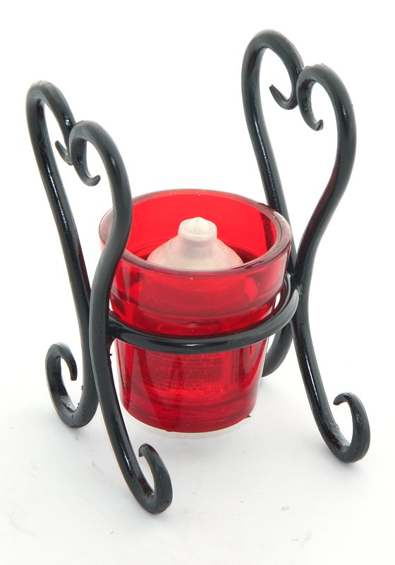 Candle Holder - Votive.jpg :: $25.00 - This delicatelly shaped mirrored-heart candle holder will set a romantic scene on any table. The piece is approx 4\