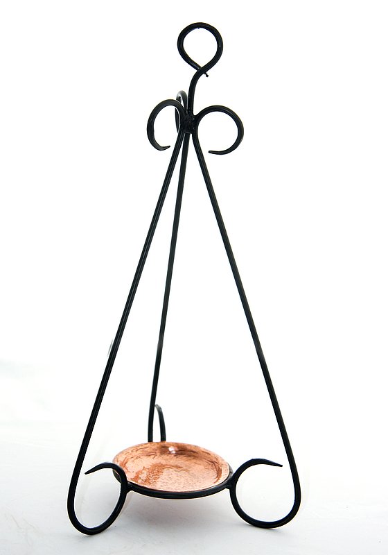 Candle Holder.jpg :: $35.00 - This delicate candle holder can be hung or placed on a tabletop. The copper bowl can be removed from the legs for cleaning. It can hold a votive candle or can even be used to burn incense. This candle holder is approx 14\