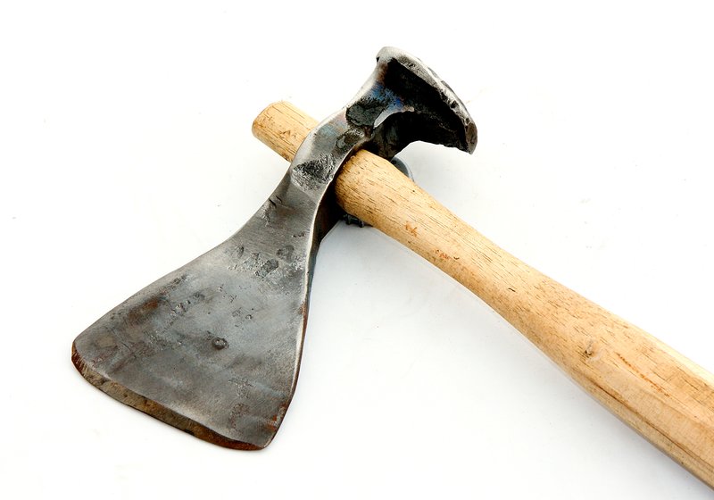 Hatchet - RR Spike.jpg :: $35.00 - The head of this hatchet is drawn out from a single RR spike. The head of the spike is used as the hammer end of the hatchet. Handle not included. Piece at cutting edge is drawn out to approx 3\