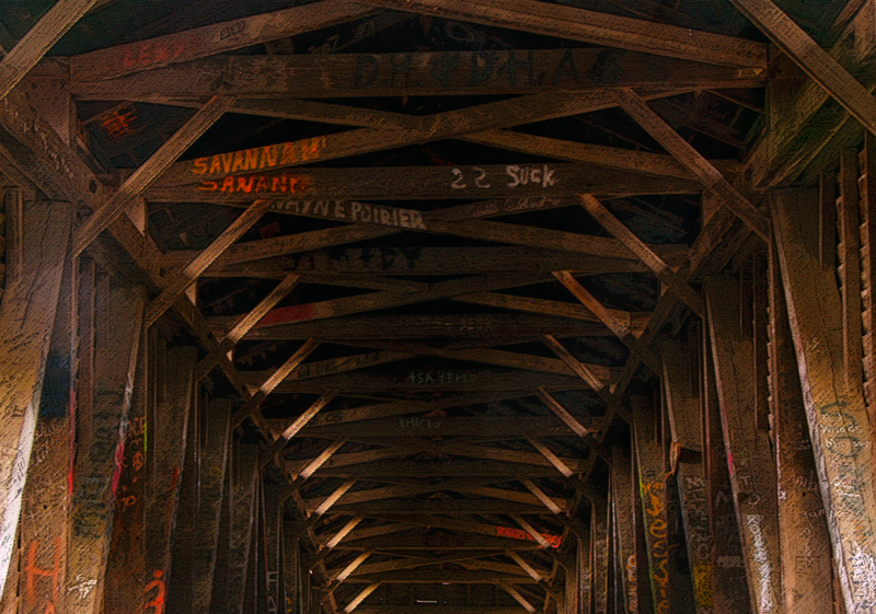 Humpback Bridge-Roof Trusses.jpg :: The trusses and framework of Hupback Bridge are almost as interesting as its classic shape. Maybe more so with all the names and dates that are etched into the wood.