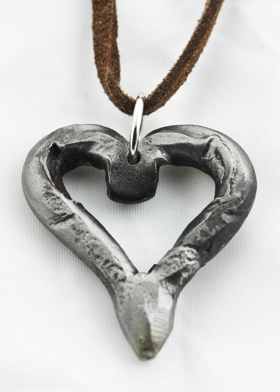 IMG_3728.jpg :: These iron hearts are hand-forged in very high heat, then shaped and molded into a unique form, and ultimately left with rough edges that define their character. Hmmm, made just like love!