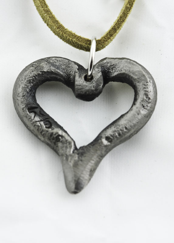 IMG_3733.jpg :: These iron hearts are hand-forged in very high heat, then shaped and molded into a unique form, and ultimately left with rough edges that define their character. Hmmm, made just like love!