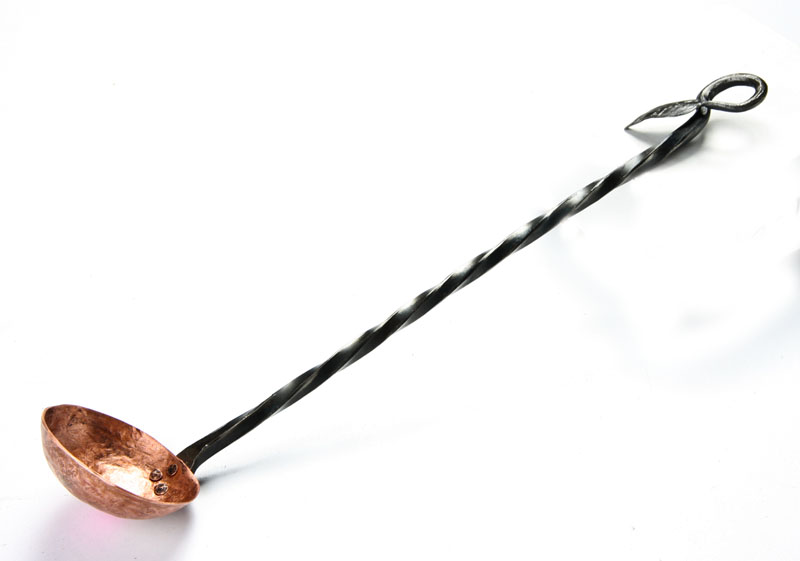 Ladle-Small Copper.jpg :: The handle on this smaller ladle is approx 12 inches long and ends in a leaf and circle for hanging. The bowl is approx 3 inches across.