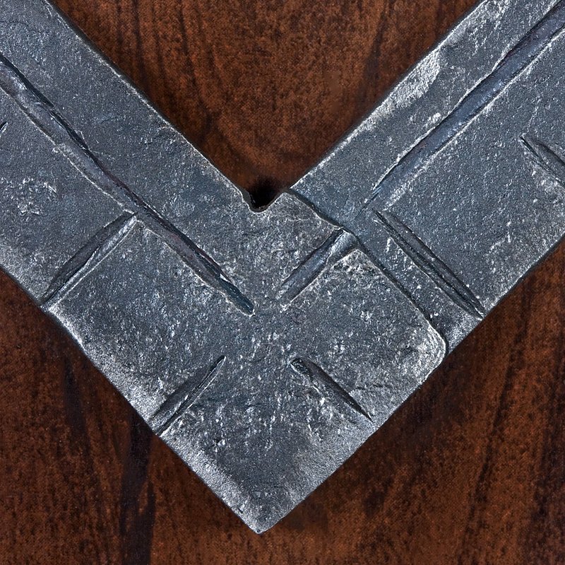 Square Detail - RTP.jpg :: The mason's square is made from a single piece of bar steel that is forge welded at the corner joint. Each mark is then added by hand.