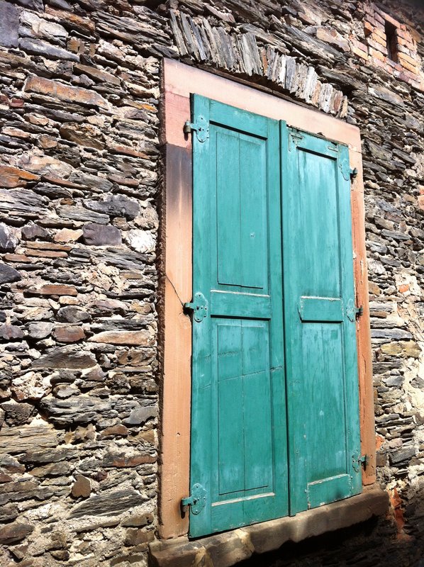 Old and New.jpg :: A colorful pair of shutters implemented into an old Roman Wall in Bernkastel, near my Hometown