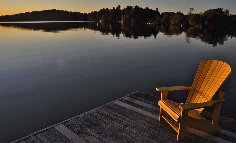 Yellow Muskoka Chair On Dock.jpg