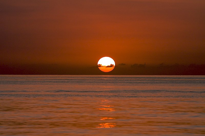 Sunset with reflecting waters 9043.jpg :: Negril Beach, Jamaica: Famous 7 mile beach of Jamaica