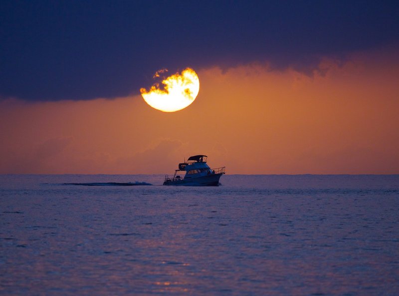 Sunset-with-fishing-boat.jpg