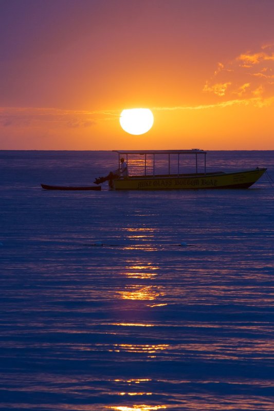 sunset-with-glass-bottom-boat.jpg