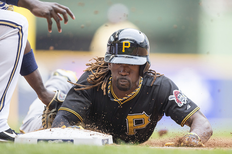 30 web(1).jpg :: May 26, 2013: Pittsburgh center fielder Andrew McCutchen #22 dives back into first base on an attempted pick off at first base. Pittsburgh leads Milwaukee 5-3 in the 8th inning at Miller Park in Milwaukee, WI. John Fisher/CSM