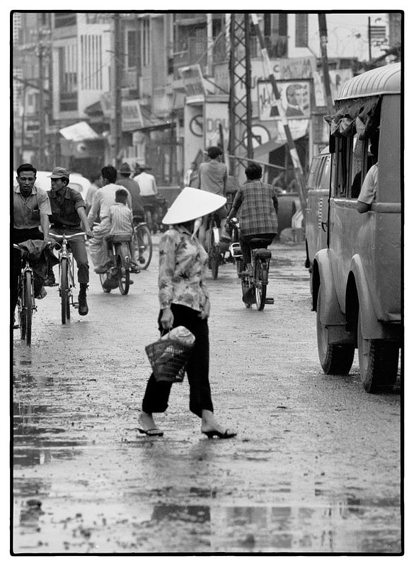 A World Away.jpg :: Street scene's like this is the norm for the Vietnamese people, it's been a long time since i stood with my cameras trying to understand a world I really never knew existed.