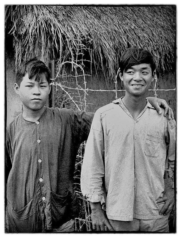 Ban Be (Friends).jpg :: Take our picture GI, the younger Vietnamese are a friendly people especially the children who are curious and mostly unafraid of approaching you. The younger Vietnamese are fairly fluent in English and are anxious to communicate. Many GI's are wary of them and shout, Di Di Man, DI DI Mau, meaning go, go, get.