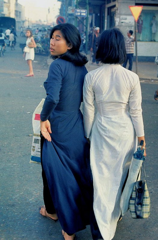 Blase.jpg :: At times I would get caught photographing people, their reactions were varied but in my three trips there I never encountered any hostility from anyone, often they would scurry to get away from the prying lenses. Others like these youg ladies were aloof or blase.