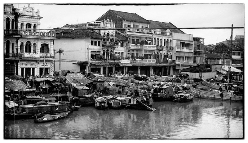 Congestion and Living.jpg :: The Vietnamese people are resilient discharging life in sometimes severe harshness, never complaining,  but if one looks closely there is an underlying wish and desire for a more fruitful life for themselves and their children. 