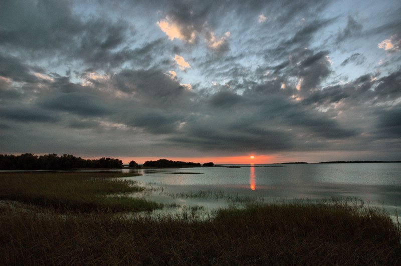 Marshlands.jpg :: The  majestic hour in Cedar Key, FL signals the end of the day as it orchestrates dramatic skies and a symphony of color over the marshlands.   