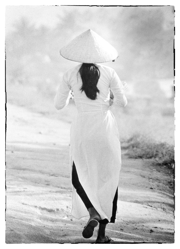 Miss Ao Dai.jpg :: The AO Day is both a practical and a regal dress worn mainly by women. Many women say they feel most beautiful when when dressed in this silk tunic. It is the national dress of Vietnam and there is an annual \