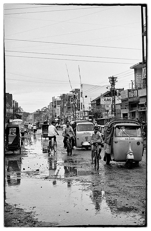 Monsoon.jpg :: Traffic returns after a brief afternoon Monsoon.