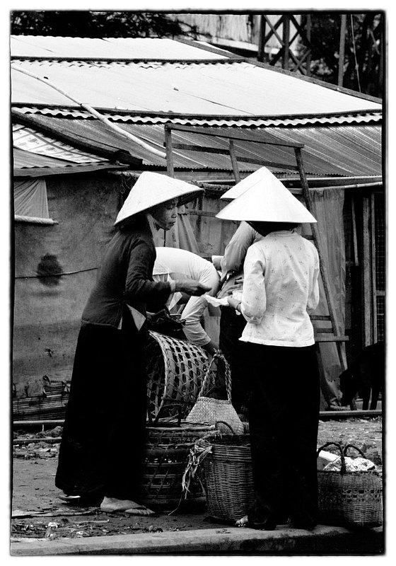 Morning Gossip.jpg :: The streets are filled early with Vietnamese people beginning their daily chores but there is a few minutes of time for gossiping. 