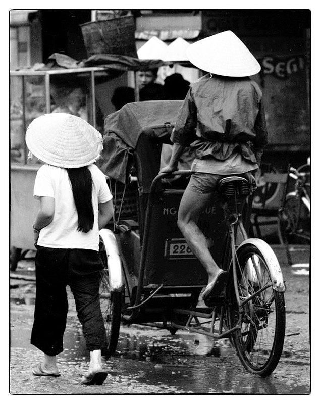 Moving About.jpg :: The traffic systems are shared by all modes of transportation all at the same time, whether it be walking, bicycle, rickshaw. auto or motorcycle. I viewed a few minor accidents and was amazed that the main concern was seemingly the condition of the vehicles involved, generally parties would look their property over and if still usable they went on their way.
