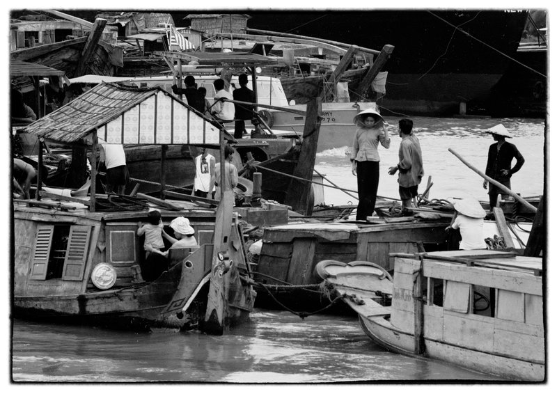 Neigbors.jpg :: The water plays such an important part of everyday life for a majority of Vietnamese people whether living on it or receiving from its bountiful produce.