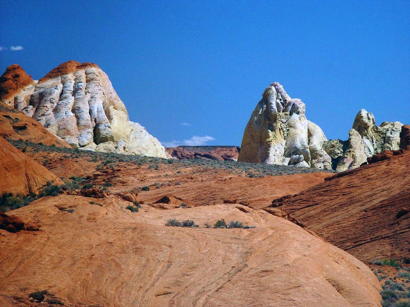 Sandstone Fingers.jpg :: Looking closely the giant fingers appear to hold the Stalactite forms in place. The Valley is part of the Mojave Desert in Nevada.  From different angles during the day, formations can appear to be on fire from refraction and reflecting sunlight.  