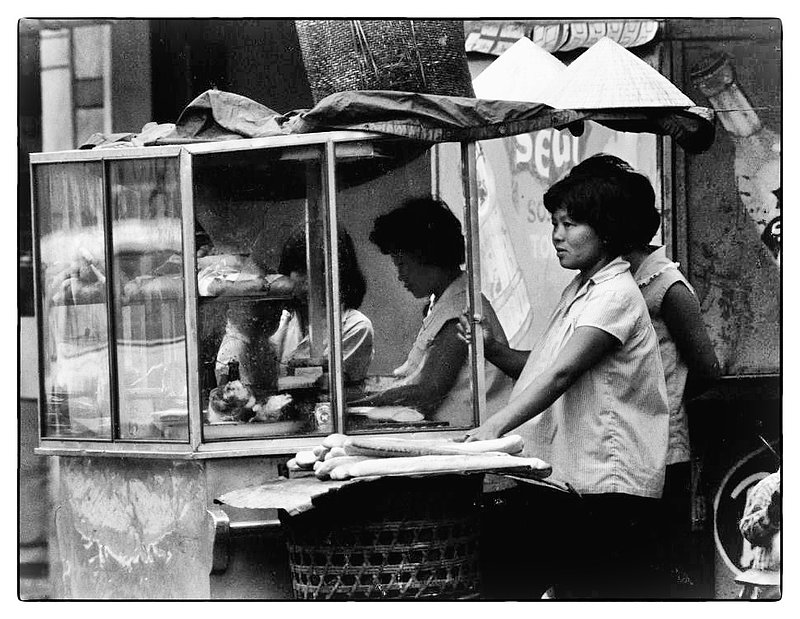Street Vendor.jpg :: Scattered everywhere throughout Saigon are street vendors eeking out a living. 