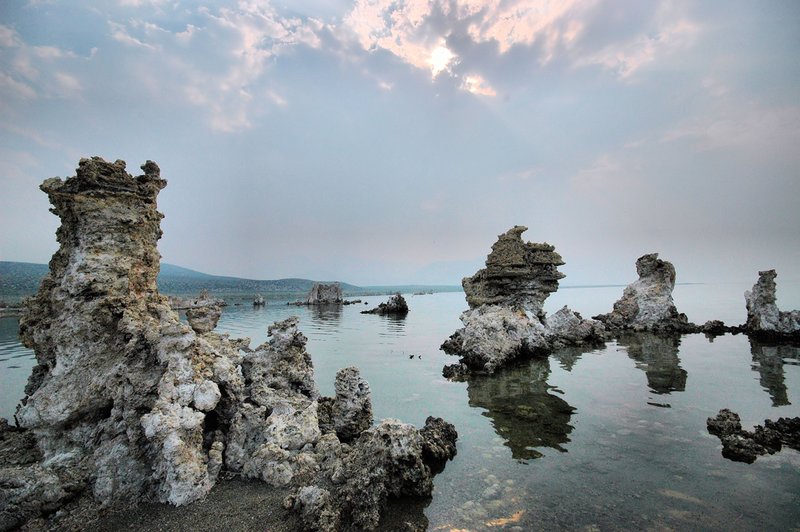 Tufa.jpg :: Remarkable limestone creations called Tufa formations rise from the lake in majestic spires.
