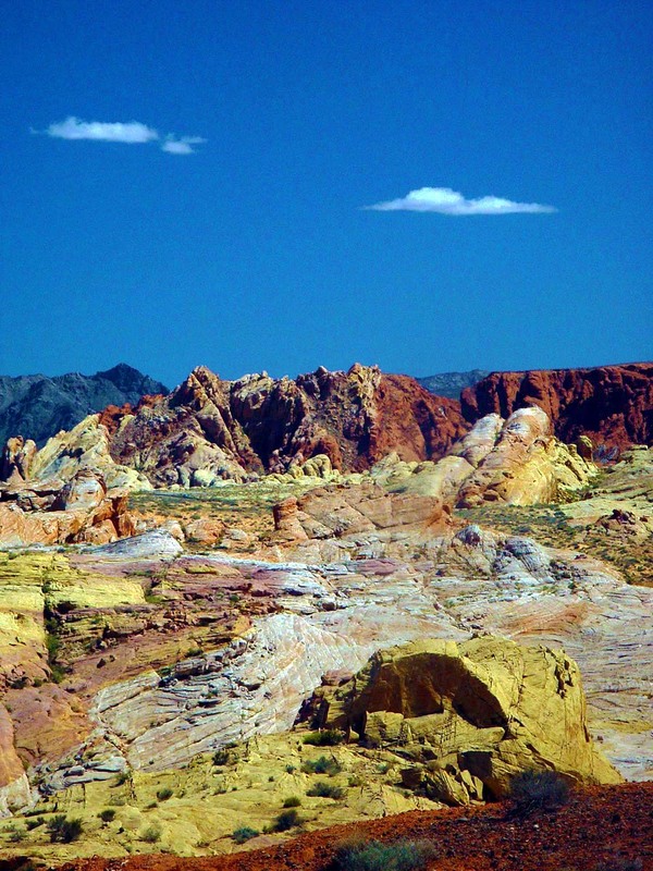 Valley of Fire.jpg :: Valley of Fire State Park, located just 50 miles northeast of Las Vegas in Nevada, is a striking desert landscape.  Acient trees and early man are represented throughout the park by areas of petrified wood an as well as  Indian petroglyphs, and sandstone formations..